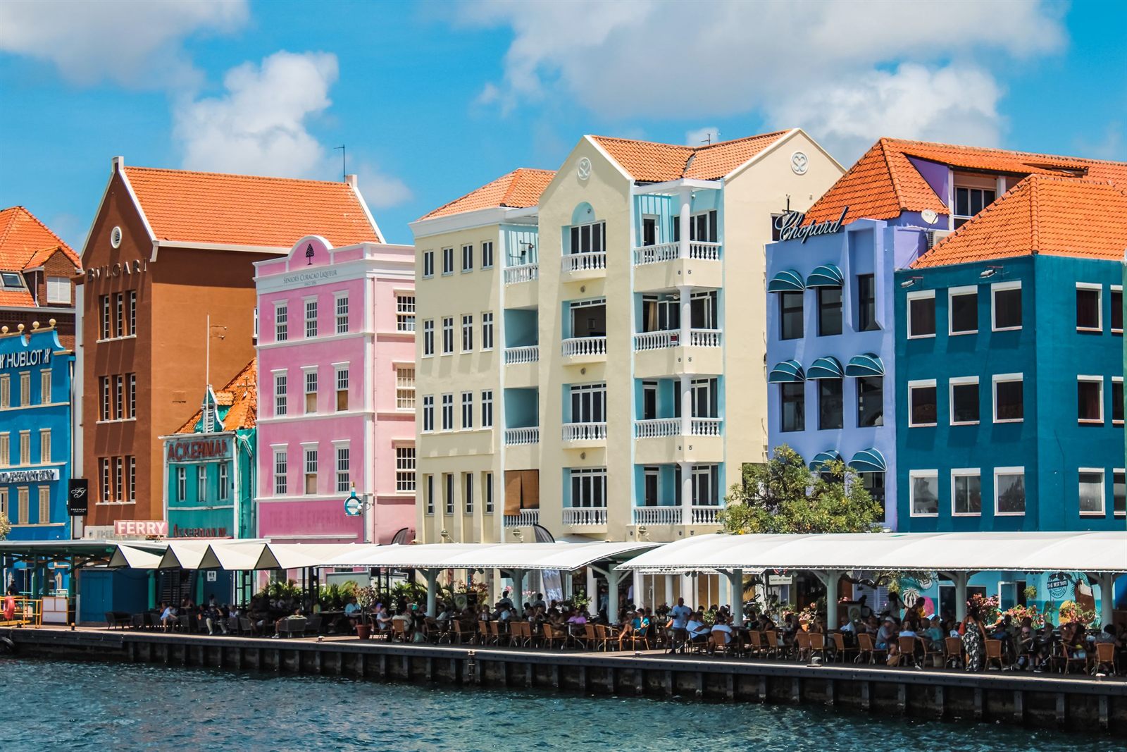 Pastel colonial buildings along the harbor waterfront in Willemstad, Curacao